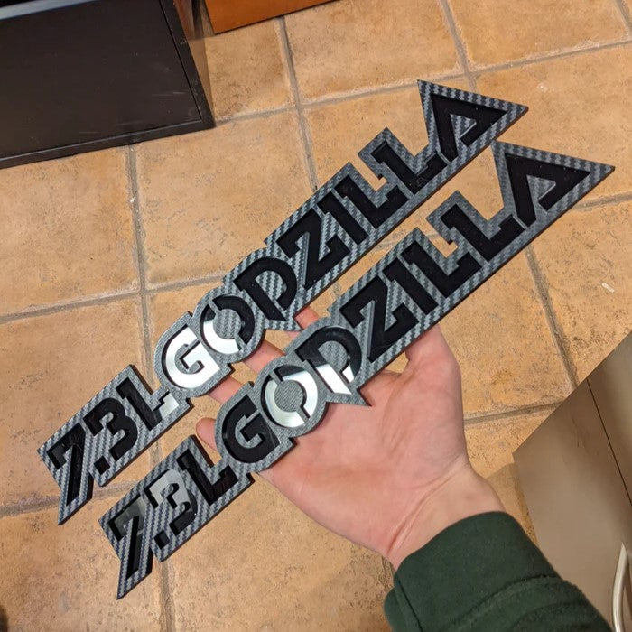 Insignias Godzilla de 7,3 l (ajuste universal), par