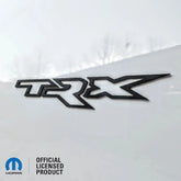 Insignia para puerta o portón trasero TRX® - Montaje con cinta adhesiva - Elige tu color - Producto con licencia oficial