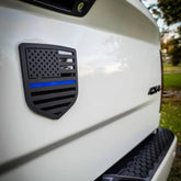 American Flag Badge - Fits 2009-2018 Dodge® Ram® Tailgate -1500, 2500, 3500 - Matte Black on Black w/Thin Blue Line