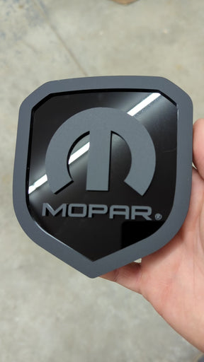 Mopar® Grille Badge - Fits 2013-2018 RAM® and 2019+ Classic Grille - 1500, 2500, 3500 - Black - Officially Licensed Product