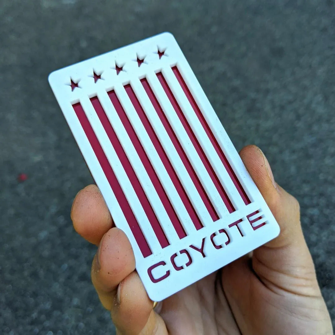 Vertical Flag Coyote Badge - Fits Mustang® - White on Red