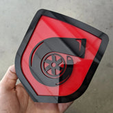 Turbo Badge - Fits 2009-2012 Dodge® Ram® Grille -1500, 2500, 3500 - Black on Red